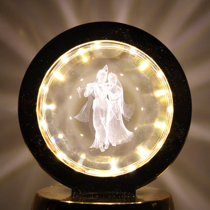 Golden base Radhe Krishna decorative lamp emitting soft ambient LED light
