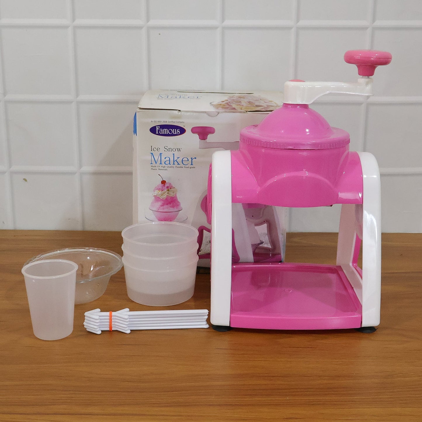 Pink gola maker placed on kitchen countertop ready for use