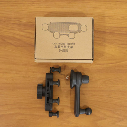 Detailed closeup of car air vent phone holder's secure grip and build quality