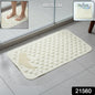Anti-slip bath mat with suction cups installed in bathroom shower for safety