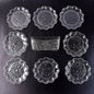 9-piece plastic bowl set with serving tray displaying transparent bowls and plates