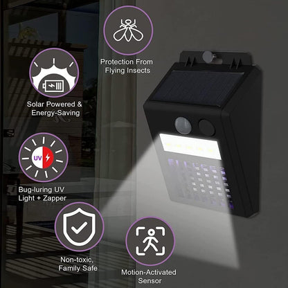 Sun-powered mosquito zapper and outdoor light mounted near a doorway.