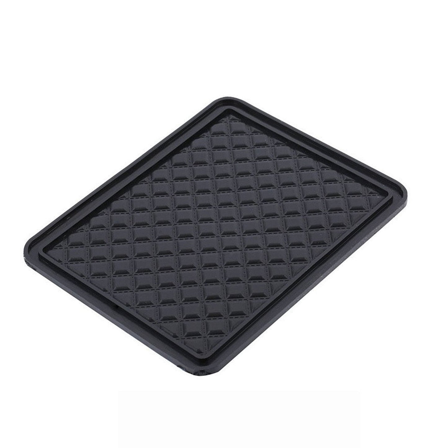 Black anti-skid mat securely holding a phone, keys, and sunglasses on a car dashboard.