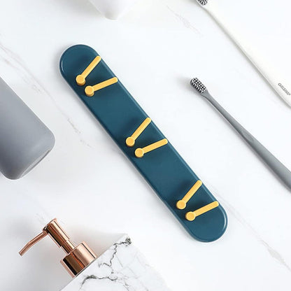Efficient wall-mounted toothbrush holder with shelves and hooks for Indian bathrooms.