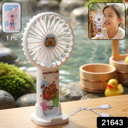 Rechargeable handheld fan featuring cartoon capybara design used as a hand fan