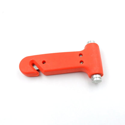 Compact car safety hammer displayed on a vehicle dashboard.