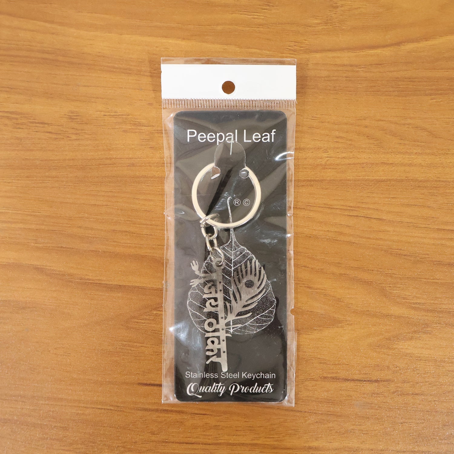 engraved peepal leaf metal keychain for spiritual symbolism