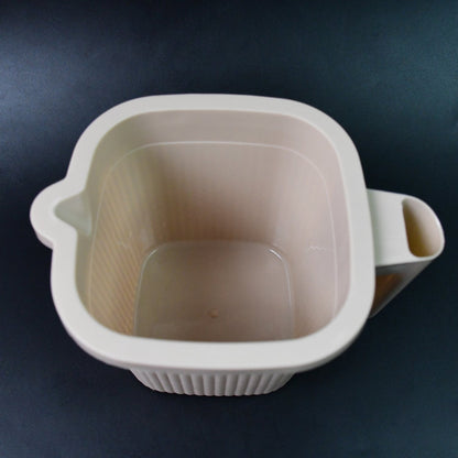 Close-up of a clear Plastic Bath Mug, emphasizing its smooth finish and robust build.