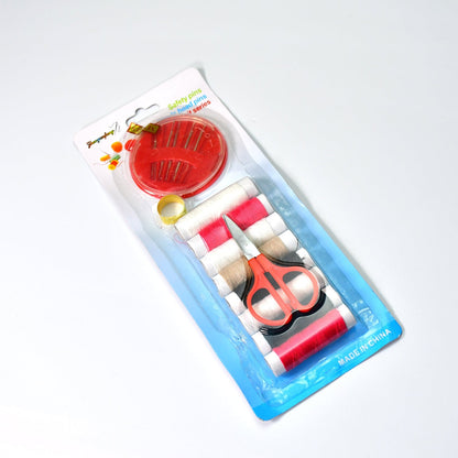 Organized sewing kit with thread, needles, and measurement tape for home use.