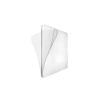 Nano adhesive tape securely mounting a picture frame, easily removable.