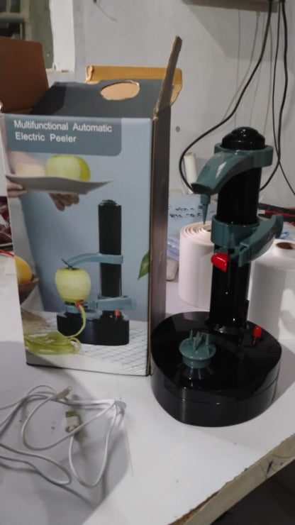 Electric peeler securely holding and peeling a potato automatically