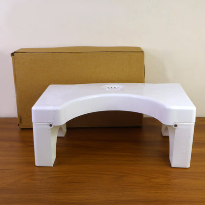 Packaging for the foldable non-slip toilet squat stool from storenzo.