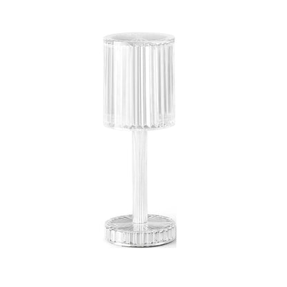 Contemporary crystal lamp illuminating a living room space with its unique design.