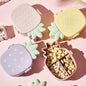 Vibrant pineapple Kids Bento Lunch Box with included fork and spoon.