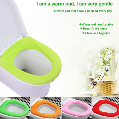 Hand demonstrating the stretchability of the cloth toilet seat cover for universal fit.