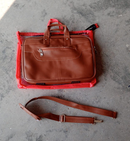 Faux leather messenger bag open with a laptop and other daily essentials neatly arranged inside.