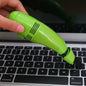Compact USB mini vacuum cleaner for precise cleaning of keyboards and car interiors.