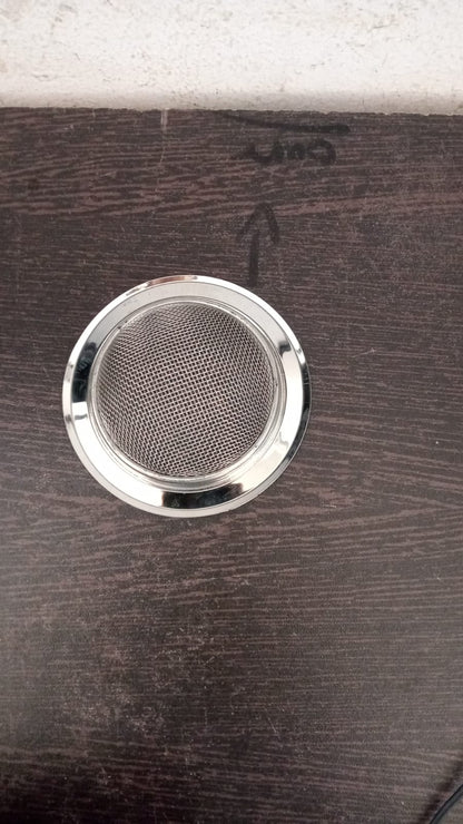 Top-down view of the effective drain stopper, preventing debris from entering the pipes.