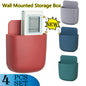 White wall mounted phone holder with a mobile phone charging.