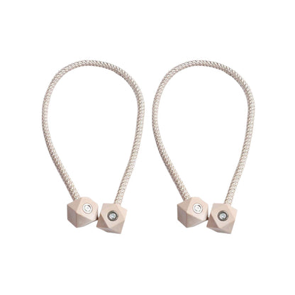 Non-magnetic pearl curtain tiebacks in use, adding a touch of elegance to living room decor.