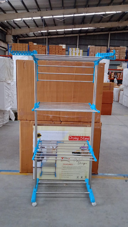 Detail of the clothes drying stand's side wings with dedicated hanger holes.