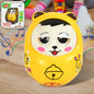 Multicolor musical roly poly toy with a cute animal face