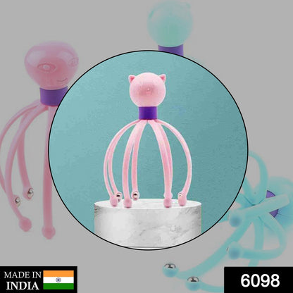 Close-up of the vibrating head massager's flexible claws on a scalp.