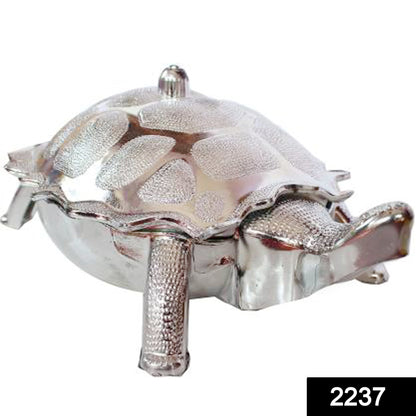 Close-up of the decorative tortoise-shaped box for dry fruits or gifts.