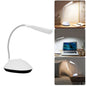 Portable LED reading light with adjustable head and touch controls.