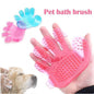 Pet grooming glove with soft rubber tips for fur removal and massage