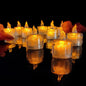 A cluster of glowing flameless LED tea light candles, creating a warm, inviting ambiance.