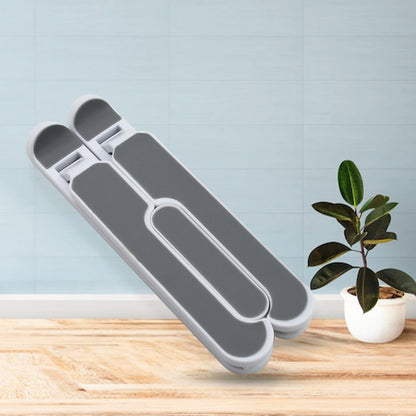 Side view of the tablet stand highlighting its built-in foldable legs.