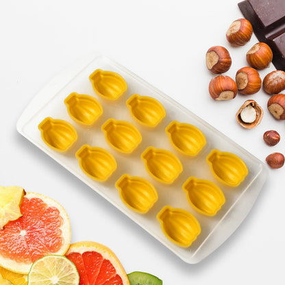 Colorful fruit-shaped ice cubes, perfectly formed from the silicone freezer mold, in a close-up shot.