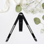 A sleek black foldable tablet stand holding a tablet at an ergonomic viewing angle.