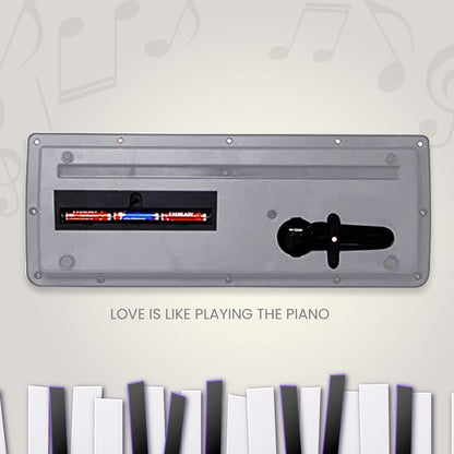 Close-up of the microphone input on the kids piano keyboard.