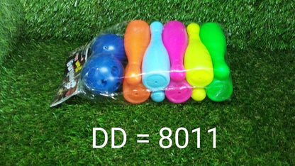 Bowling pins and balls perfectly arranged, ready for the next round of fun and skill development.