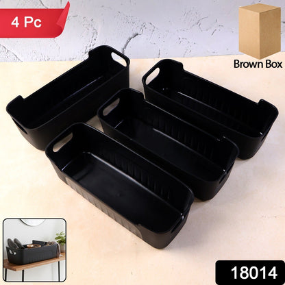 Close-up view of black plastic storage basket trays with handles