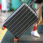 Set of eight vibrant silicone luggage wheel covers, ideal for suitcase protection.