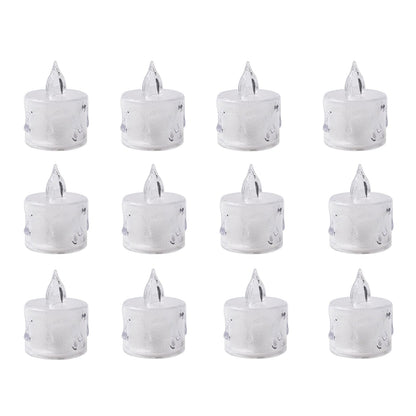 An array of decorative acrylic candles illuminating a festive display.