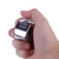 Portable stainless steel hand tally counter with 4-digit display.