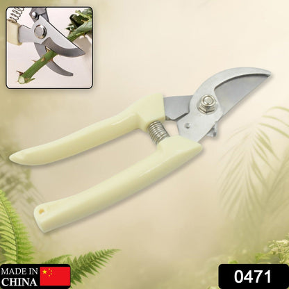 Close-up of the sharp blades of the pruning shears, ready for cutting.