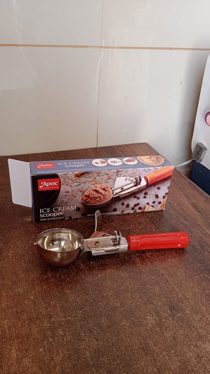 Angled view of Apex ice cream scoop with stainless steel head and handle
