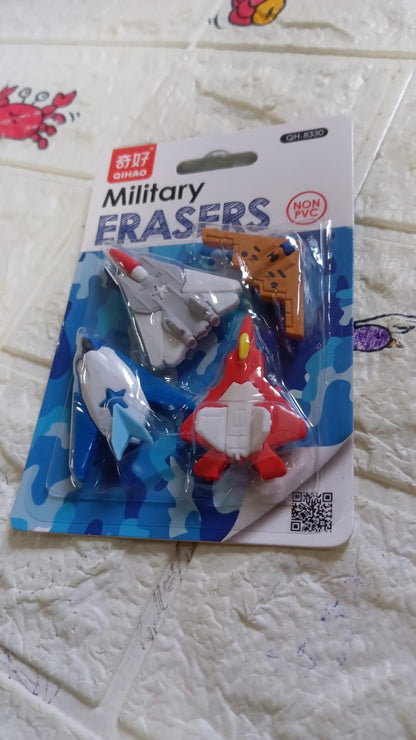 Creative gun and plane erasers arranged for a fun display.