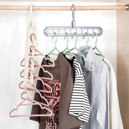 The multi-functional 9-hole hanger efficiently organizes various clothes inside a closet.