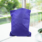 Reusable grocery bag in a neutral colour, folded for compact storage.
