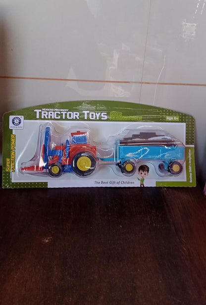 Angled side view of the friction tractor toy with its attached bricks trolley.