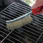 Stainless steel wire brush with ergonomic handle, ideal for rust removal.
