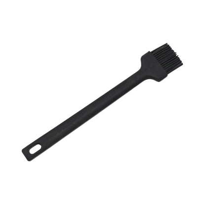 Top-down view of a versatile silicone oil brush for cooking.