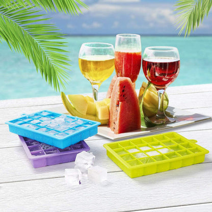 Hand removing perfectly formed ice cubes from a flexible silicone tray.