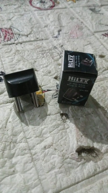 Multiple 2 Pin Plug Adapters arranged on a surface, ready for use.